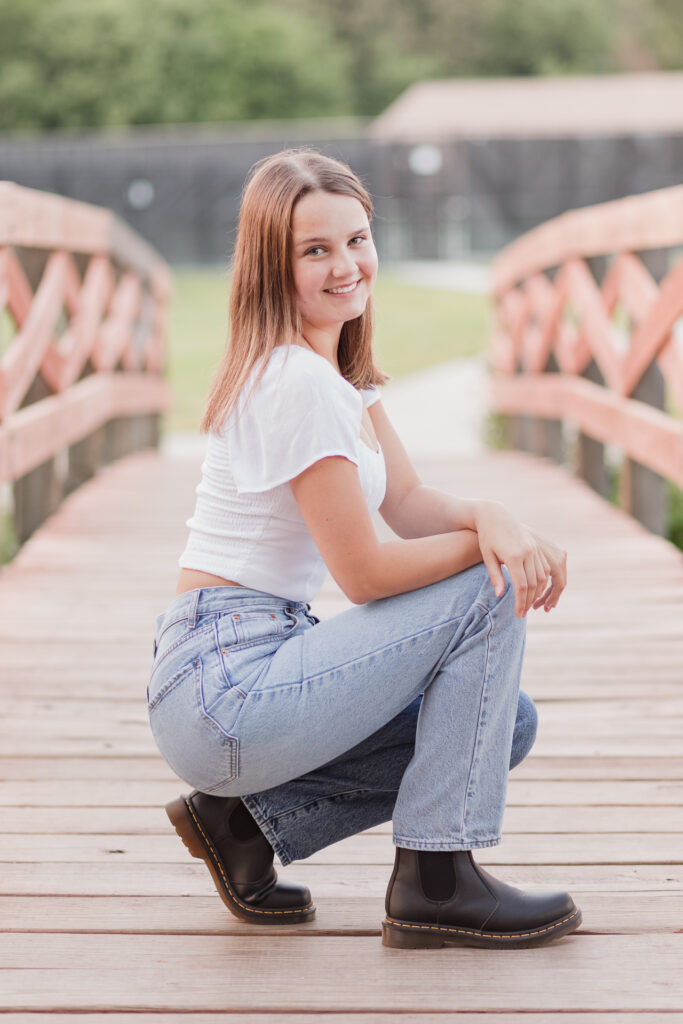 senior girl on a bridge
