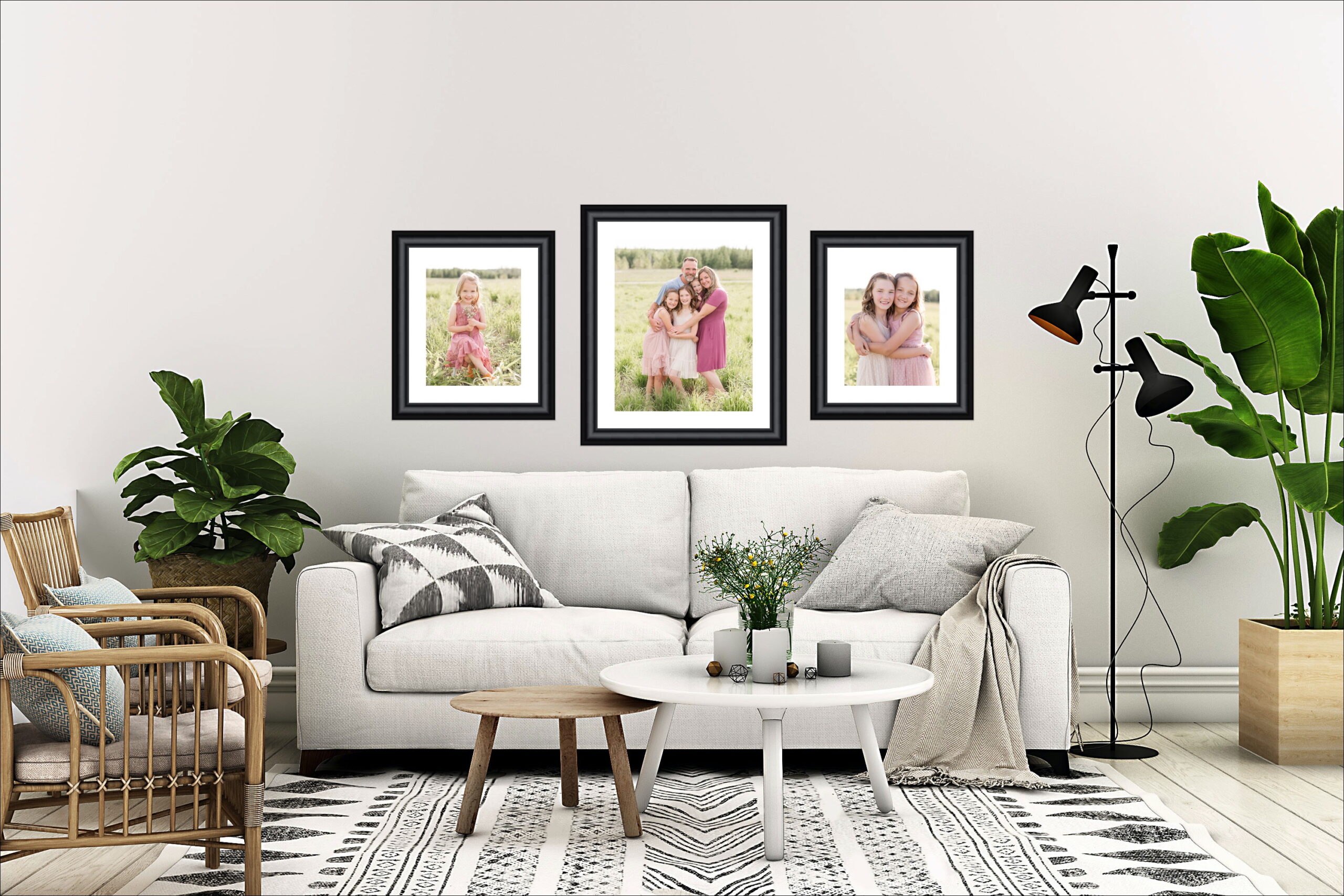 Family images in a trio of wall art in living room