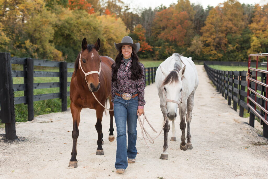 senior girl with her horses