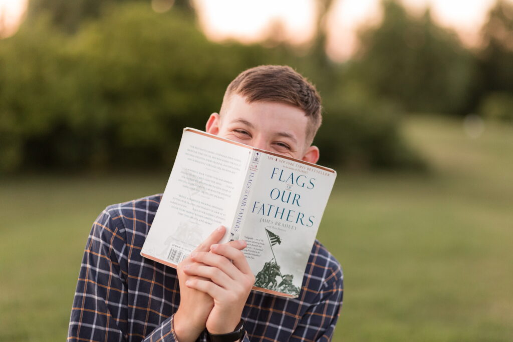 senior guy reading a book